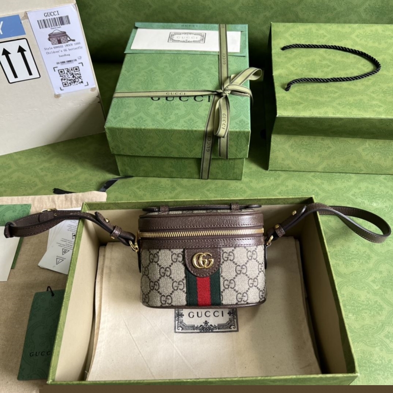 G*u*i cosmetic bags